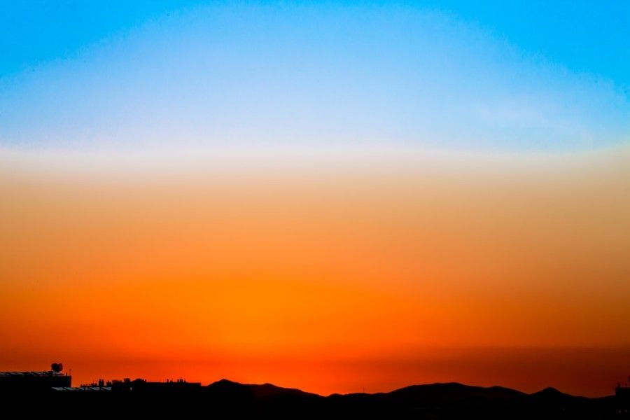 blue-and-orange-sky-and-silhouette-of-hills-wallpaper