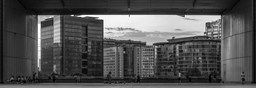 gray-scale-photo-of-people-outside-building