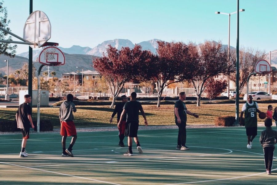 men-playing-basketball-during-daytime