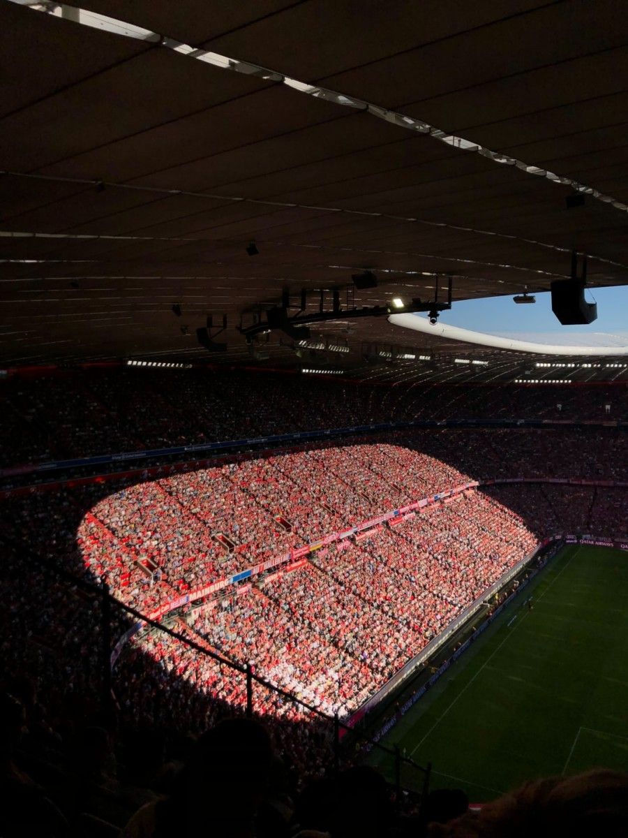 people-gathering-inside-stadium-during-daytime