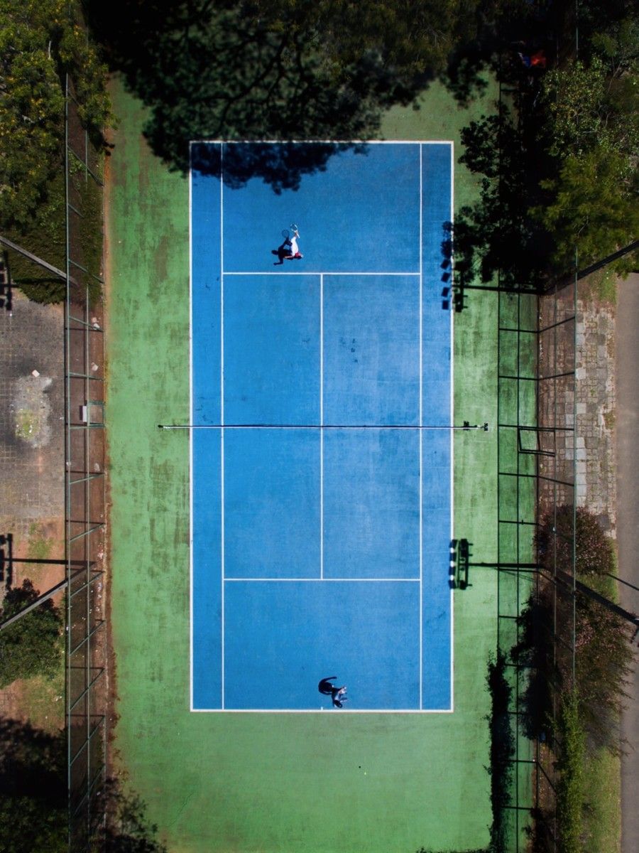 two-men-playing-tennis