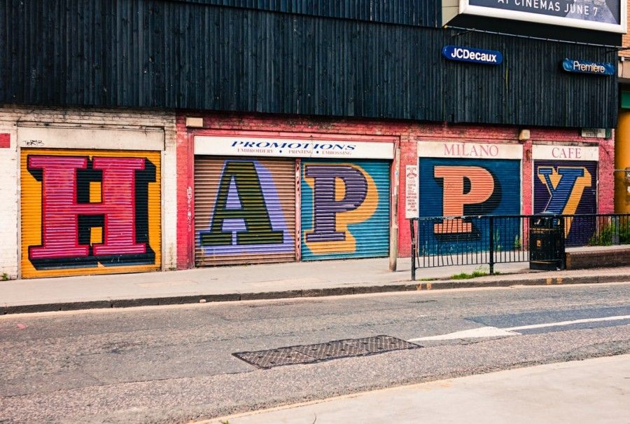 multicolored-happy-roll-up-door-graffiti