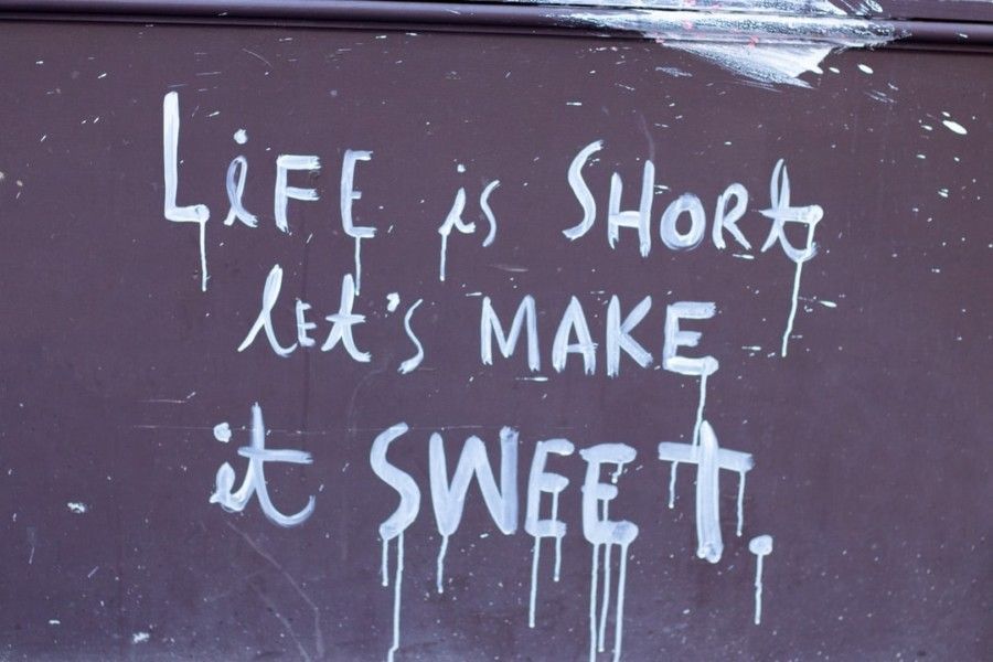 life-is-short-lets-make-it-sweet-text-on-background-background