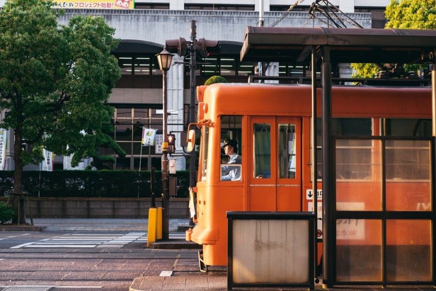 man-driving-orange-train