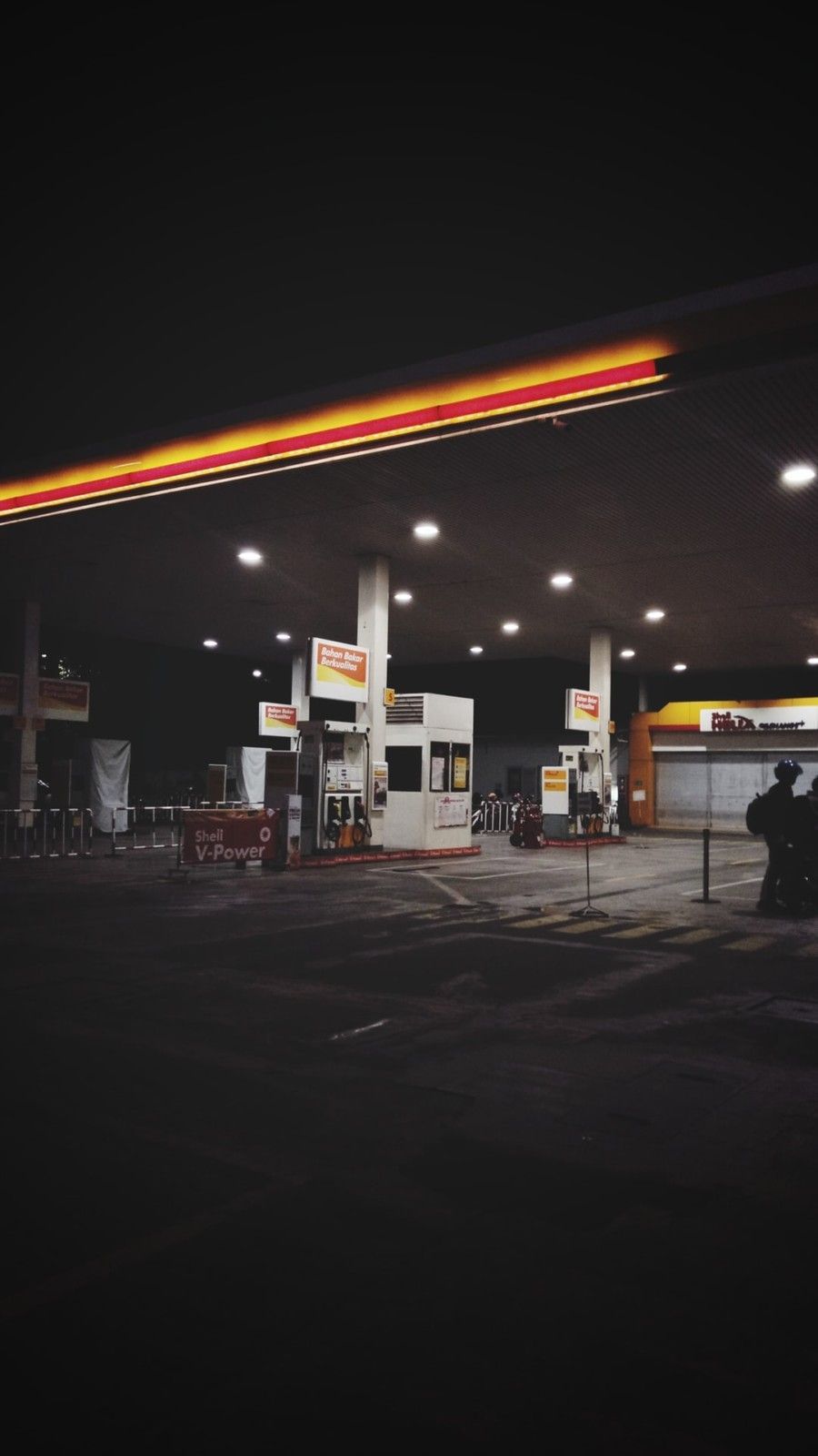 white-gasoline-station-at-night